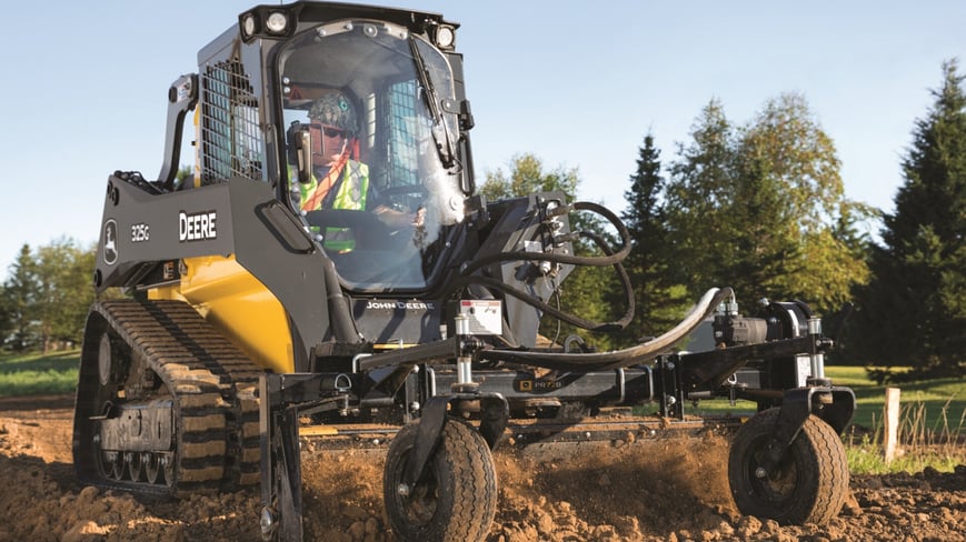 325G Compact Track Loader with leveling attachment.