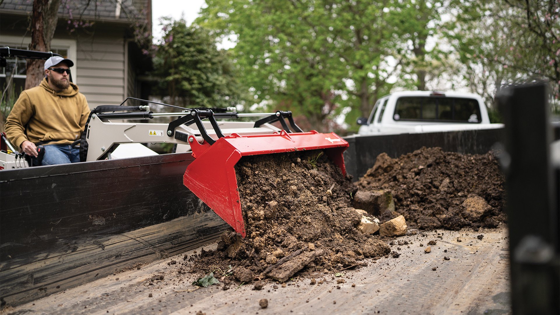 Best-compact-tractor-for-moving-dirt-Koenig-Equipment