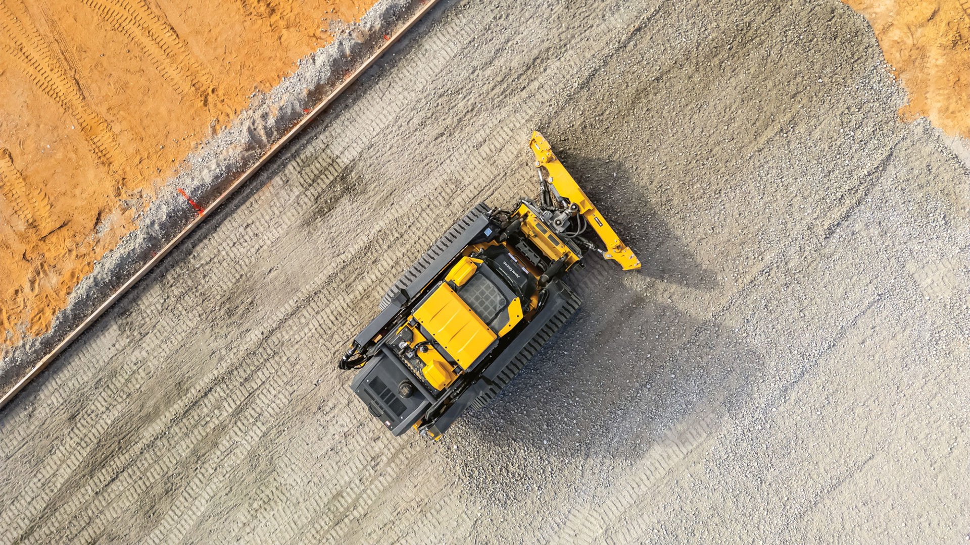 JD Skid Grading Rock