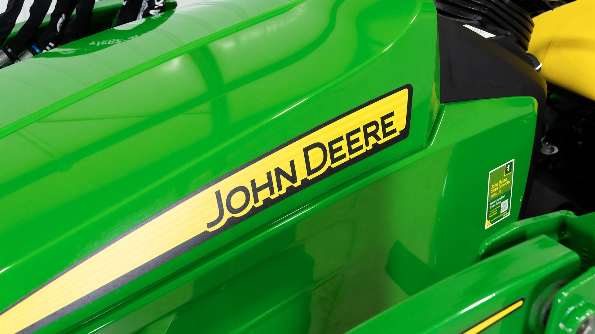 John-Deere-1025R-sub-compact-utility-tractor-stored-in-a-standard-residential-outbuilding
