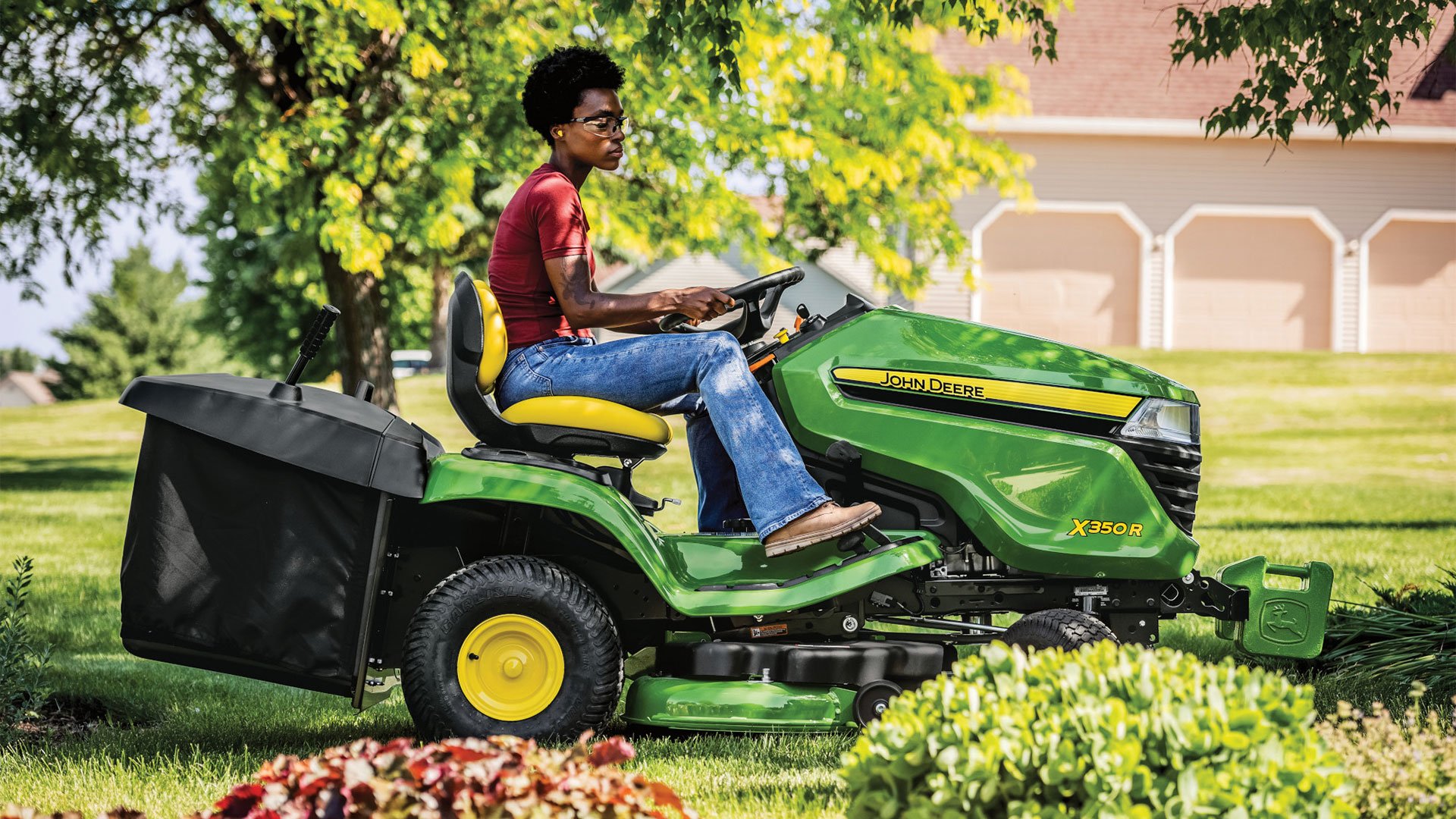 John-Deere-Mower-X350-with-leaf-bagger-Koenig