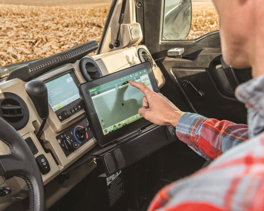 A Combine operator uses ActiveVision in the field.