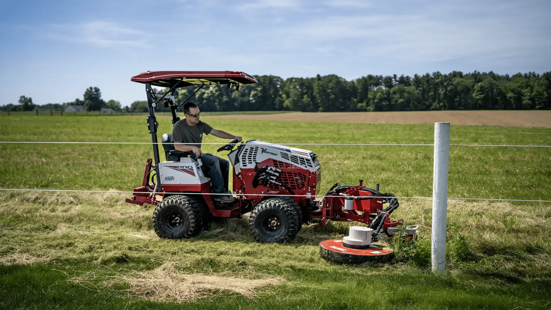 Ventrac Post Mower deck approaching a fence post