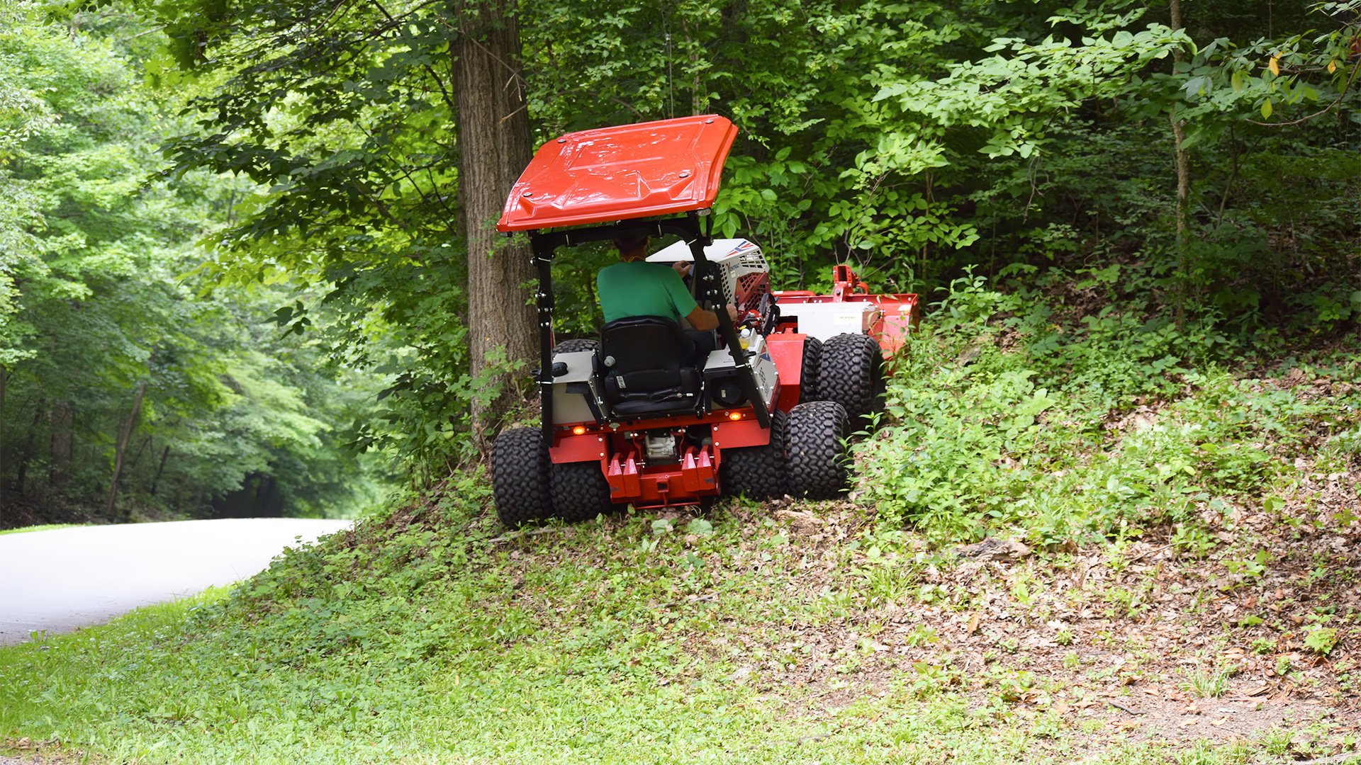 Ventrac-Mowing-steep-hill-with-tough-cut-attachment