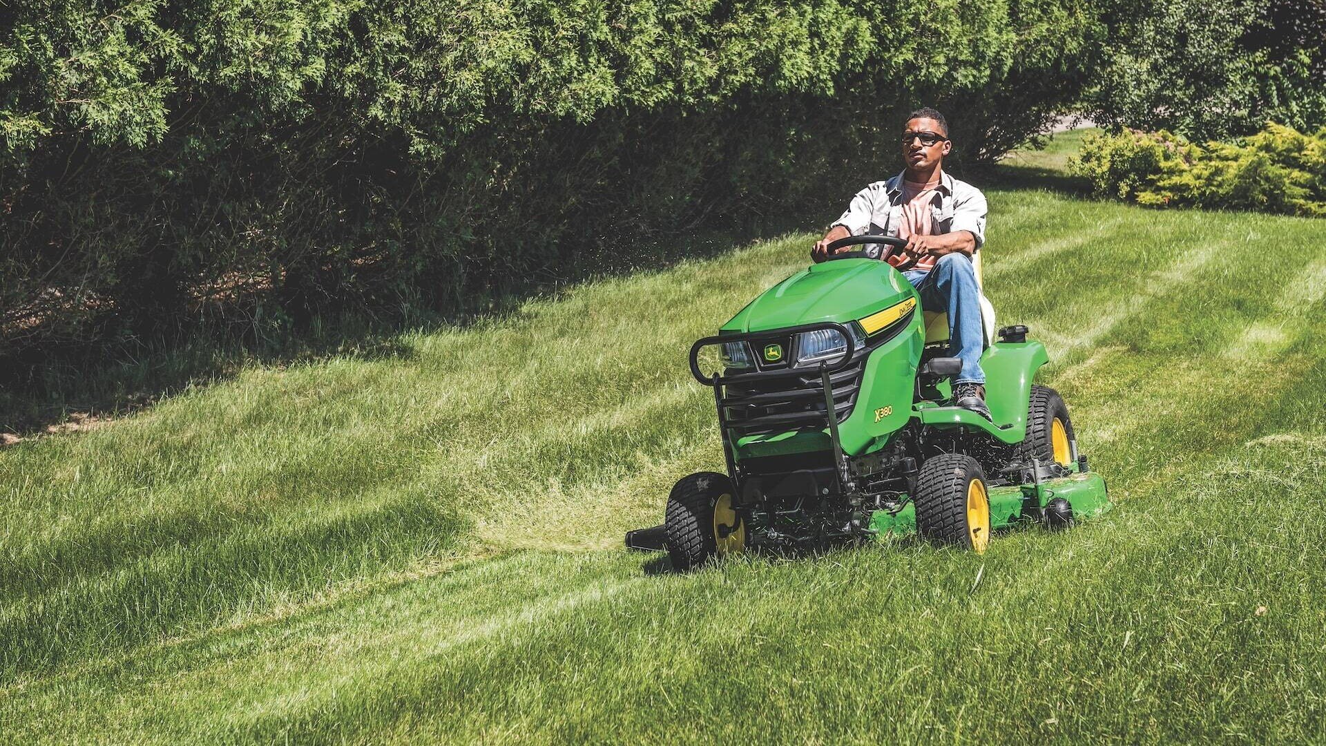 X380 Select Series Tractor on hilly terrain