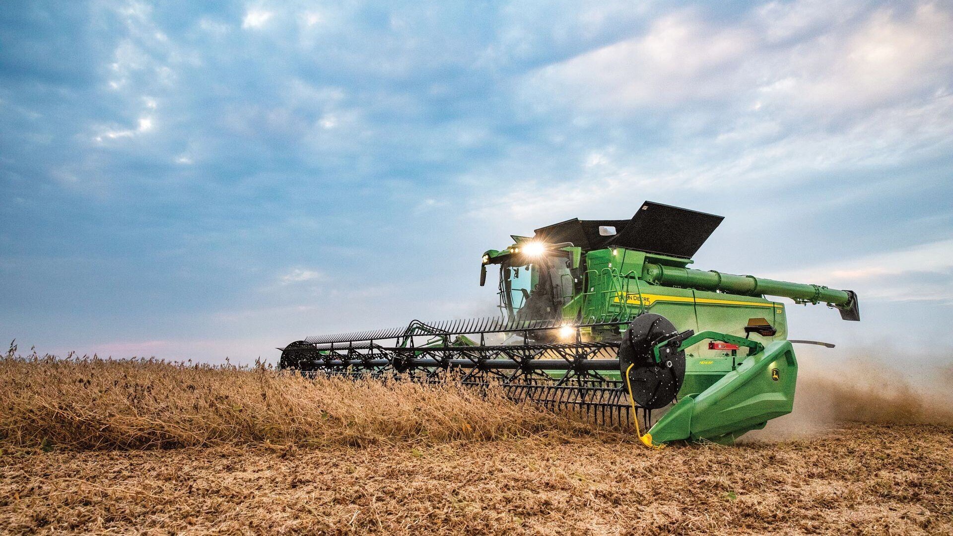 X9 1000 Combine showcasing its harvesting capabilities in the field