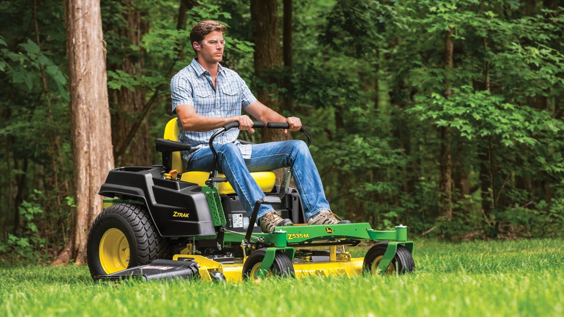 Z535M Zero-Turn Mower being used on a residential property