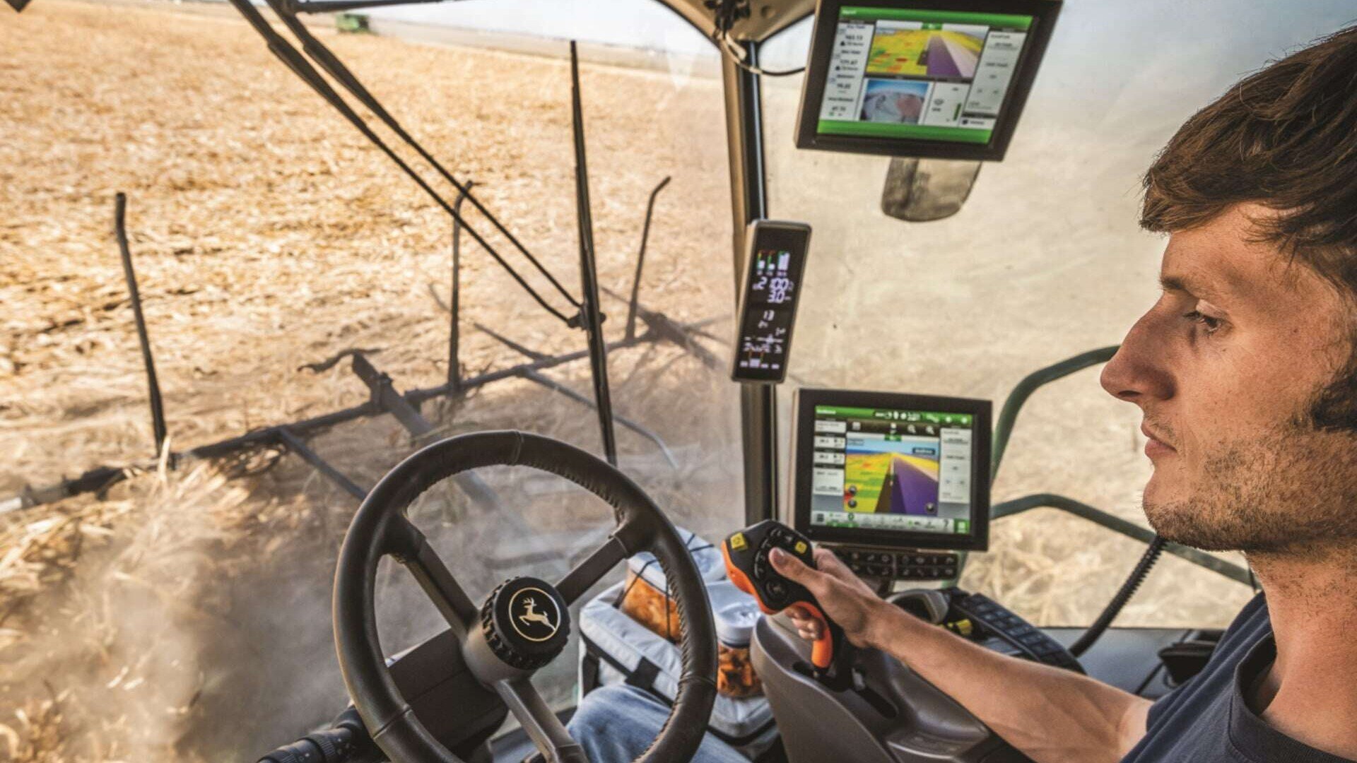 precision ag displays used in a combine during harvest