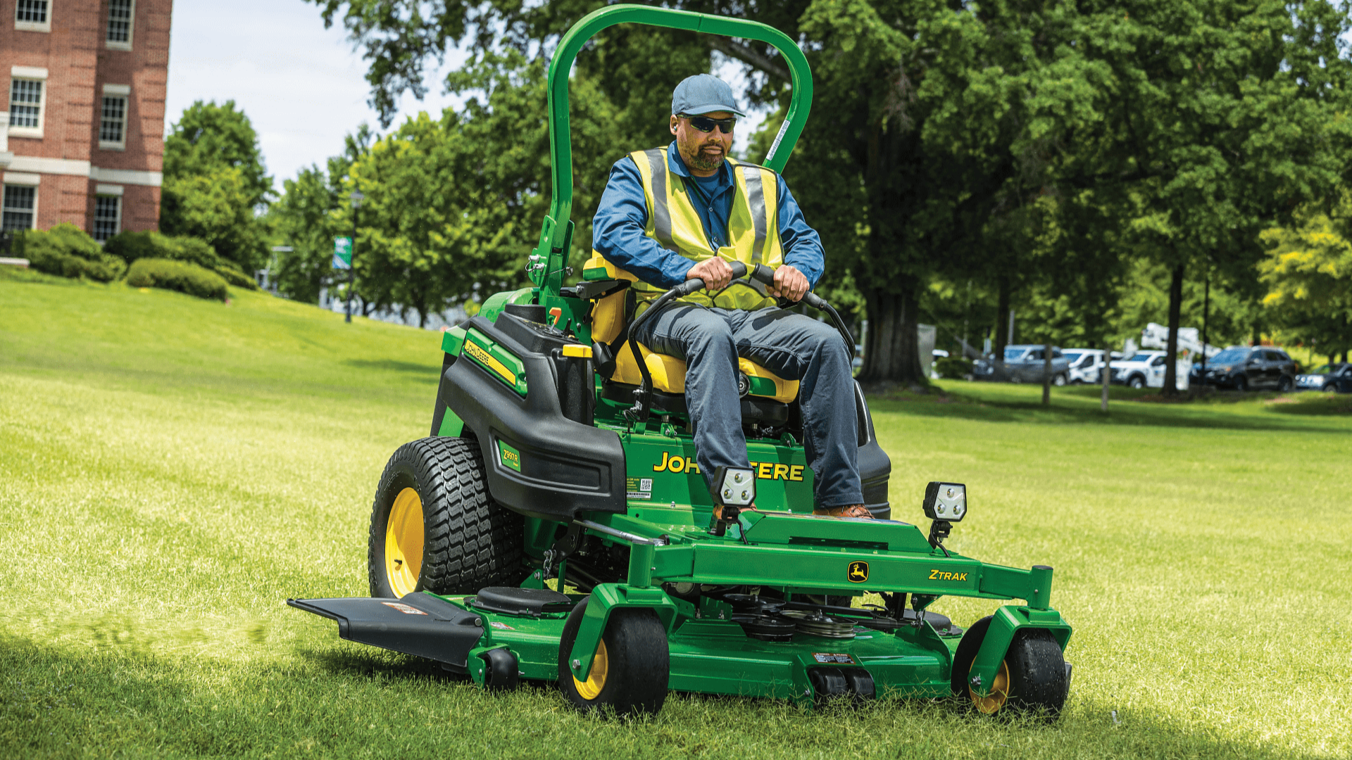 Z997R zero turn commercial lawn mower cutting grass on a university campus