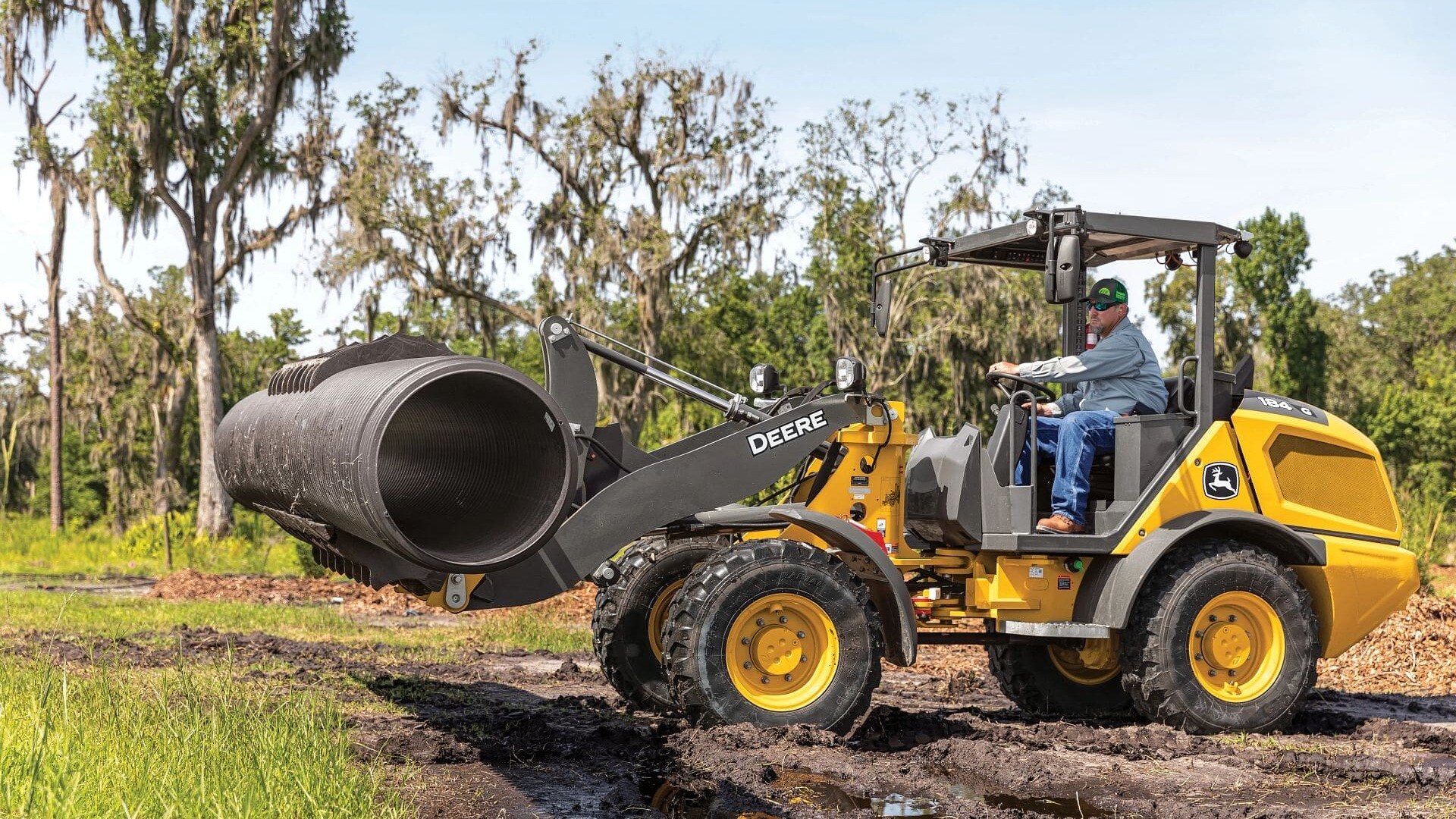 wheel loader moving tile for a job