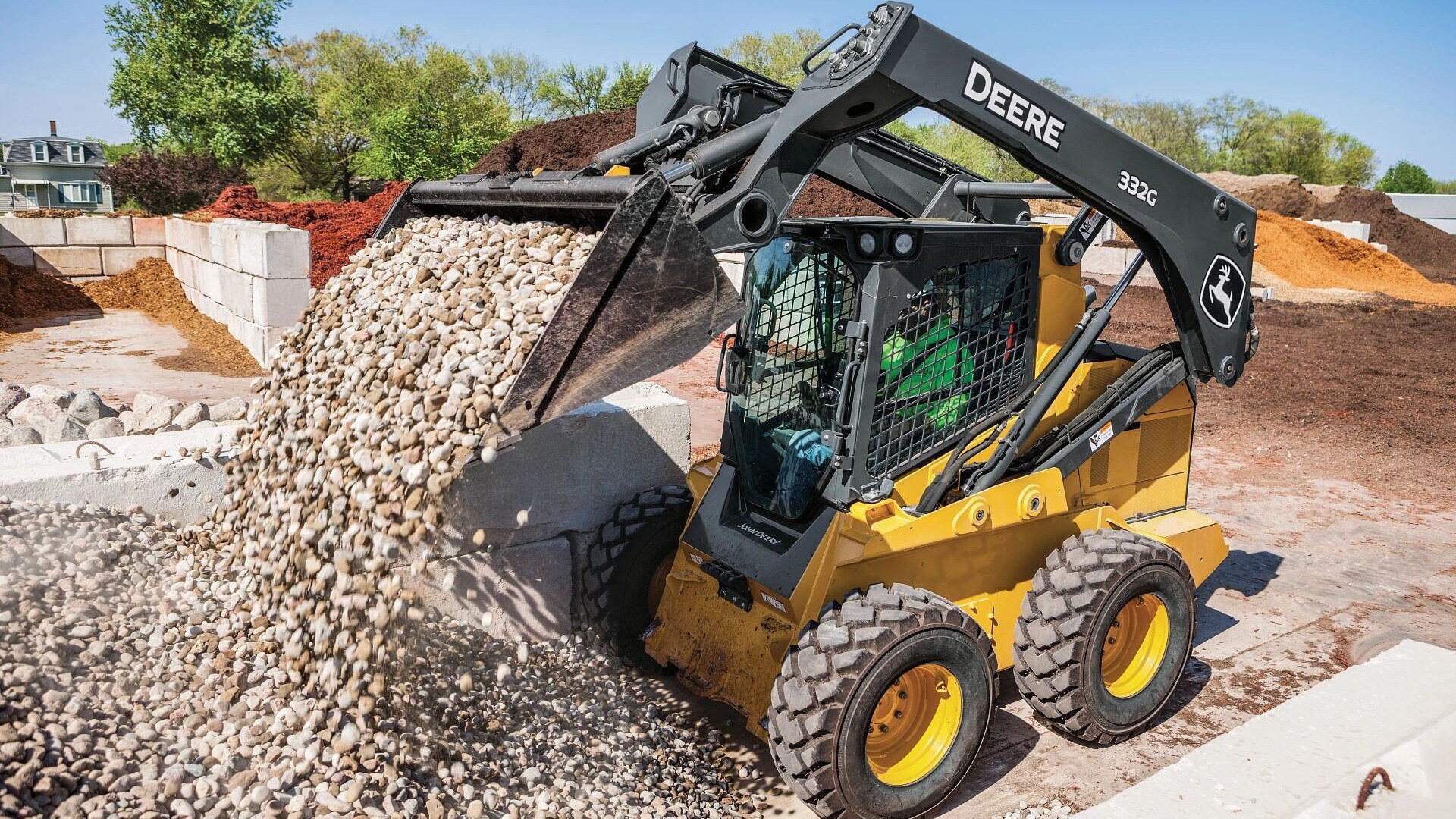 332G Skid Steer Lifting Stones